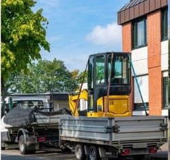 Heavy equipment being transported to a Ras Al Khaimah industrial site